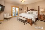 Master Bedroom- King Bed, TV, & Balcony Access